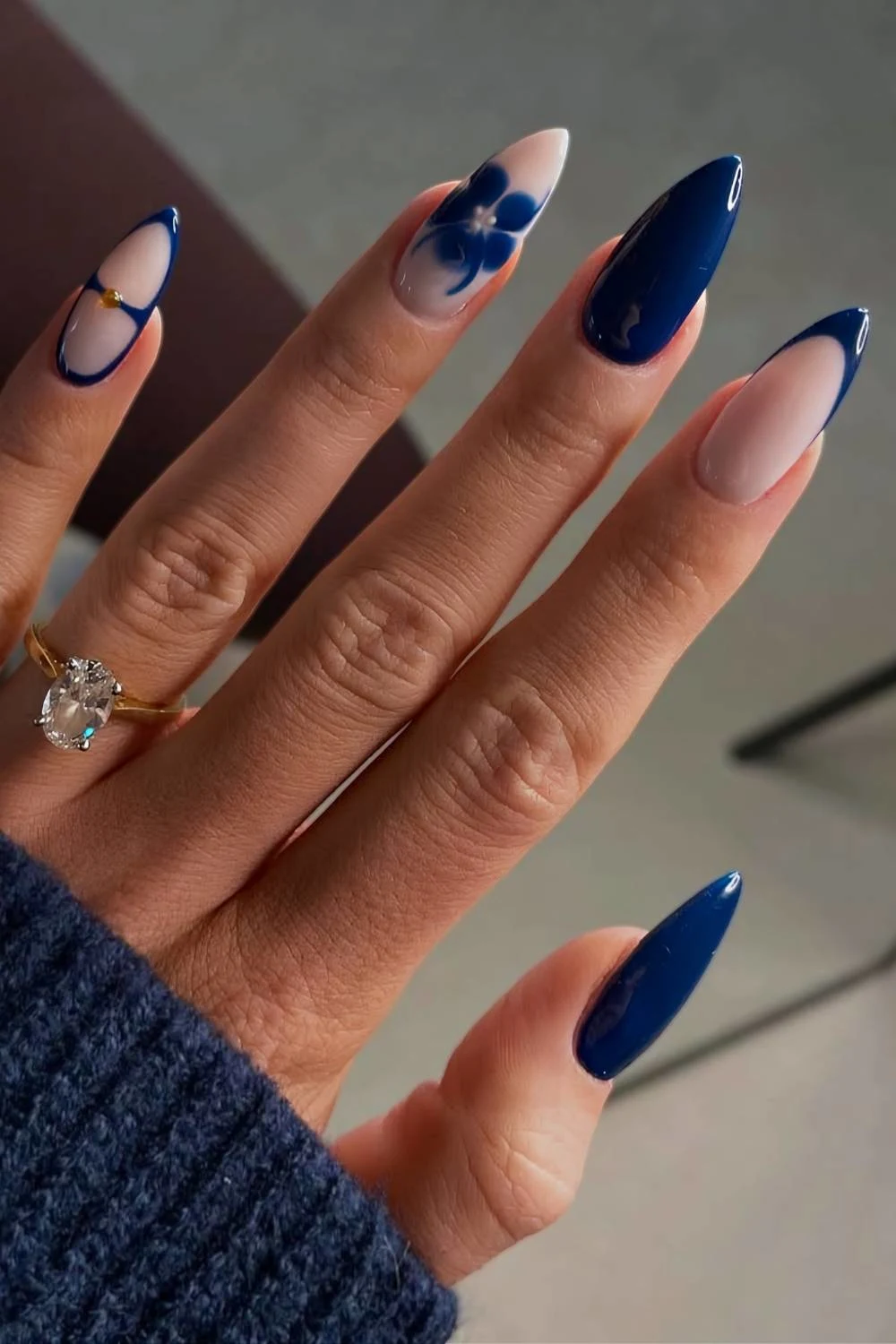 Navy blue nails with accent blooming gel flower