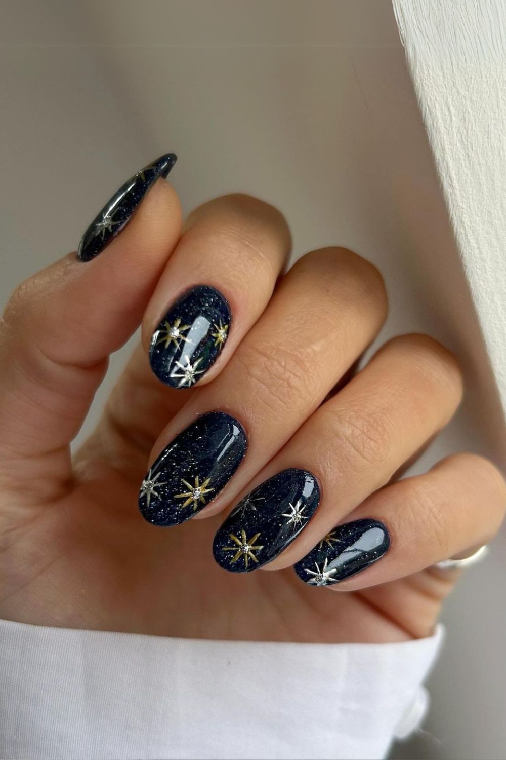 Navy blue nails with glitter and stars