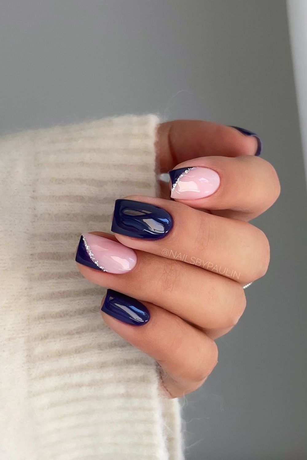 Navy manicure with side tip accents