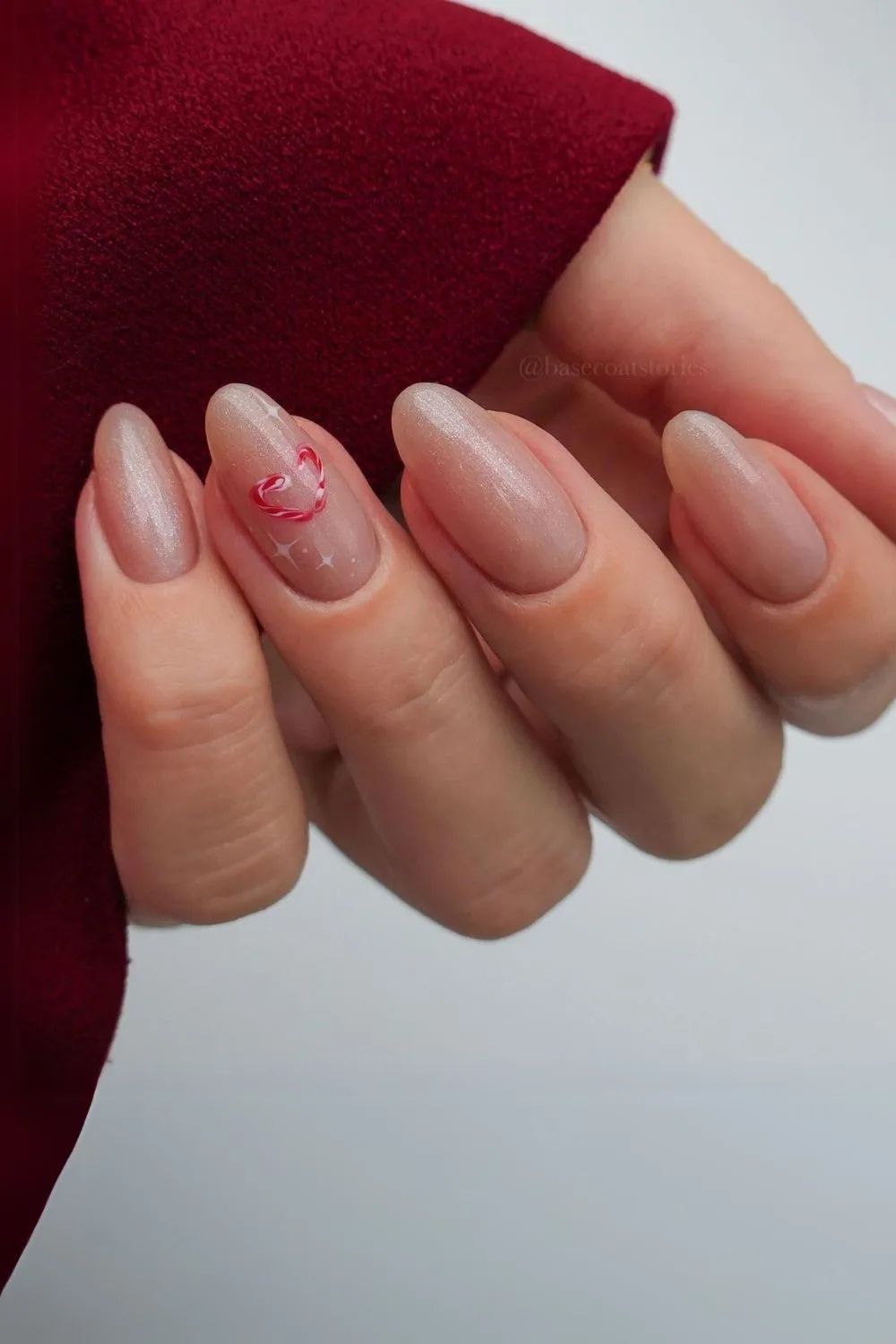 Neutral Nails with candy cane heart accent