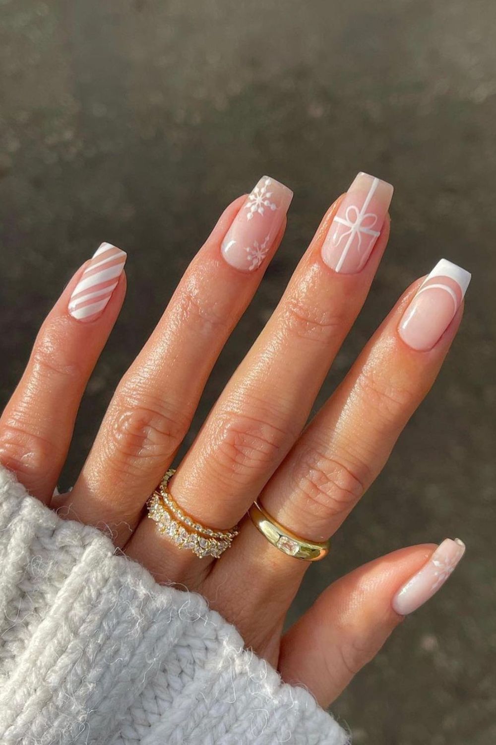 Neutral french tip nails with mix and match accents