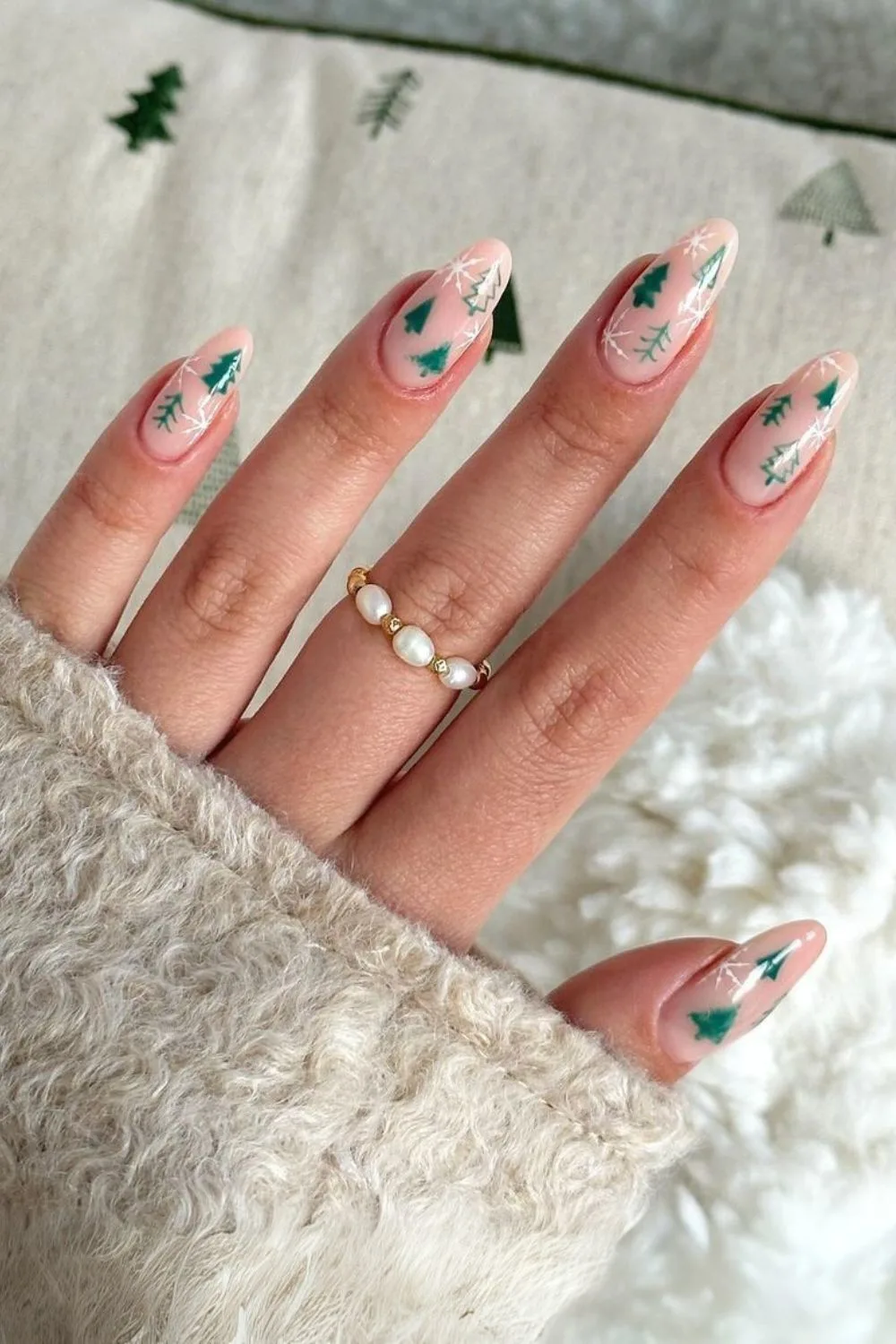 Nude nails with Christmas tree accents