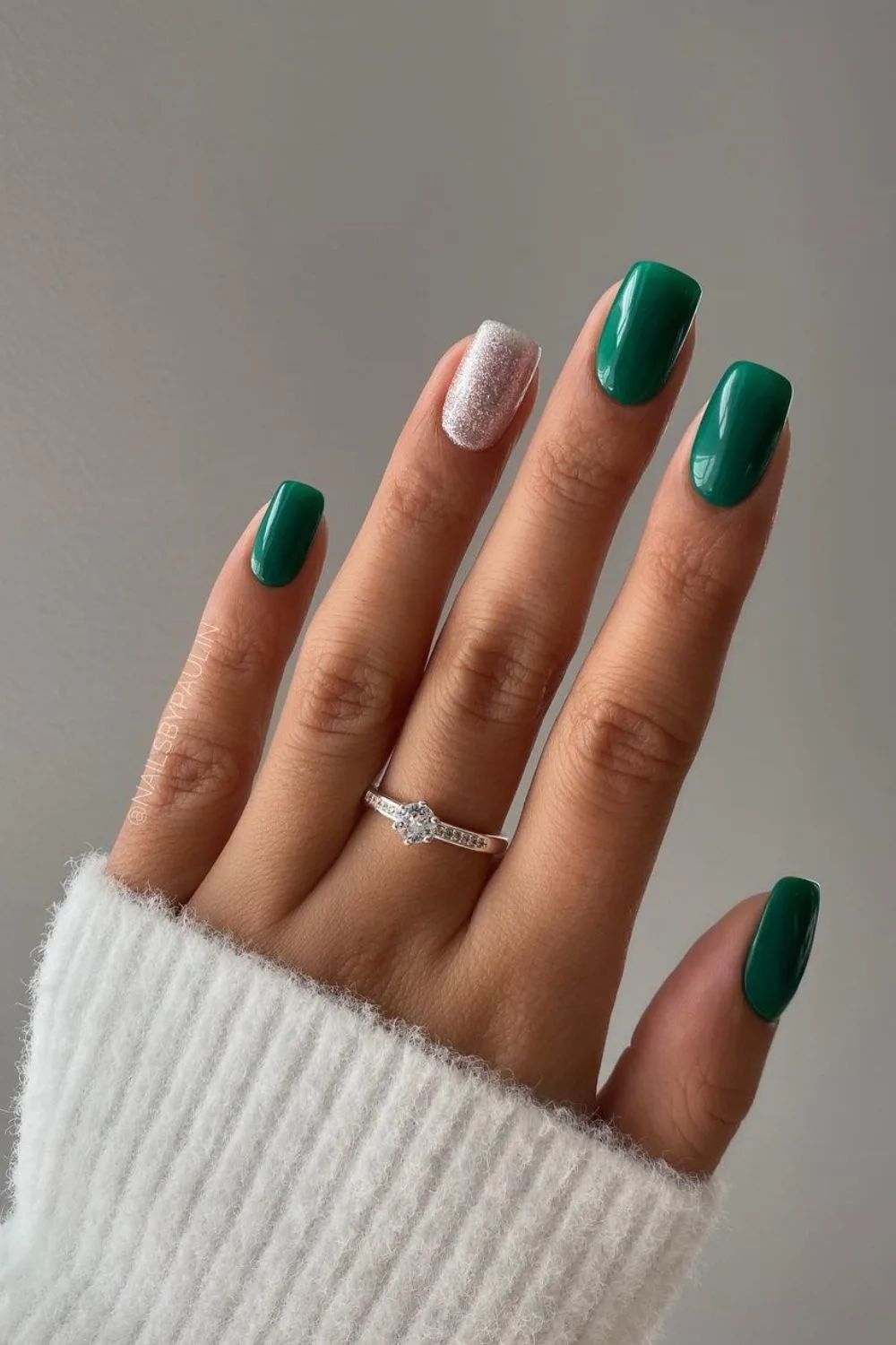 Pine green nails with silver glitter accent