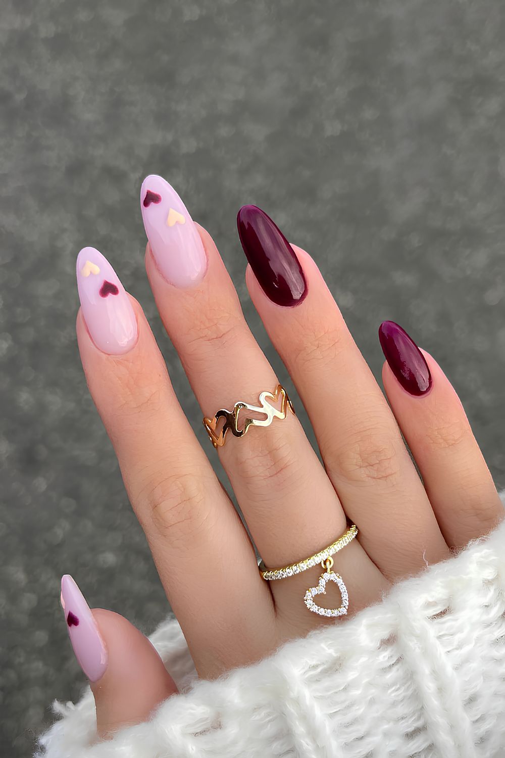 Pink and burgundy nails with hearts