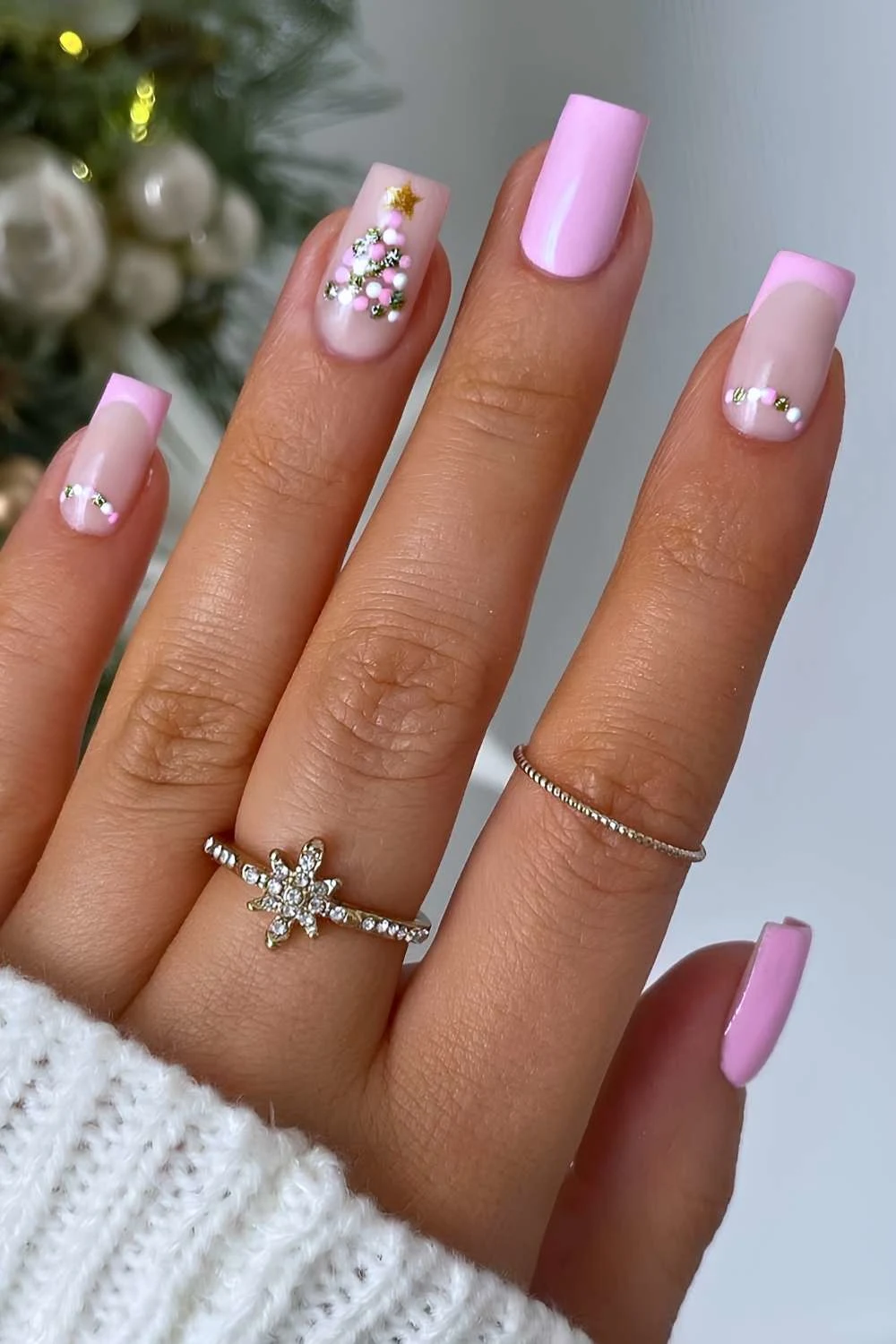 Pink manicure with Christmas tree art