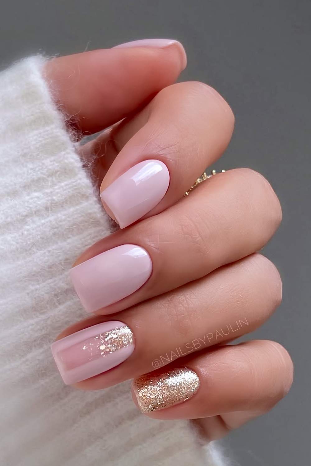 Pink manicure with accent gold glitter