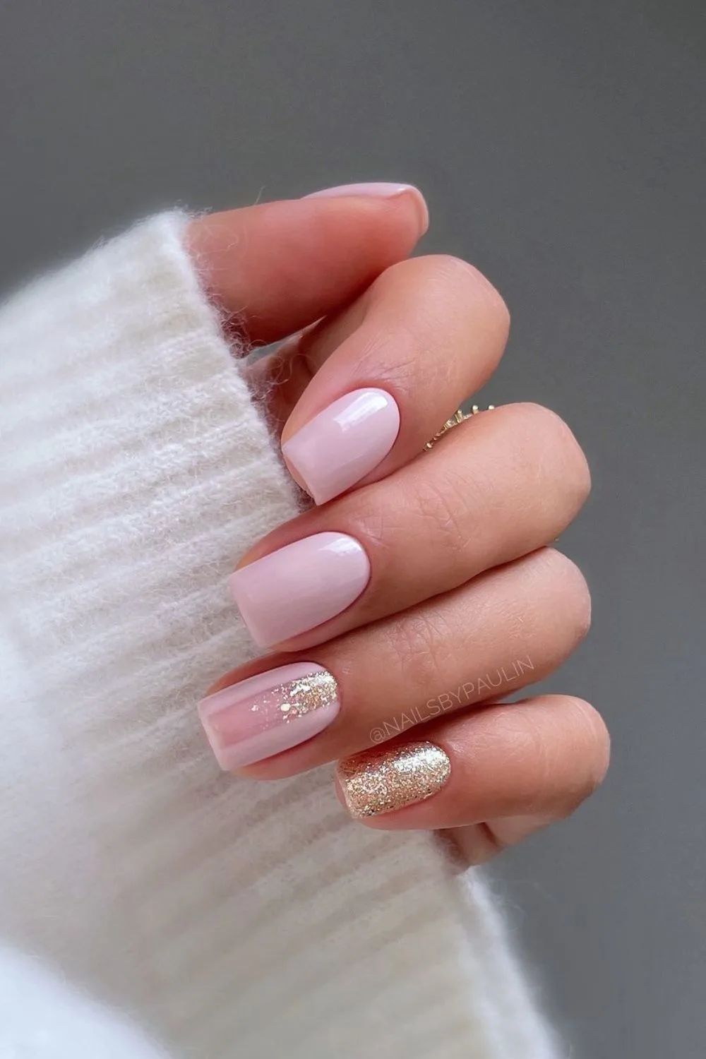 Pink nails with gold glitter