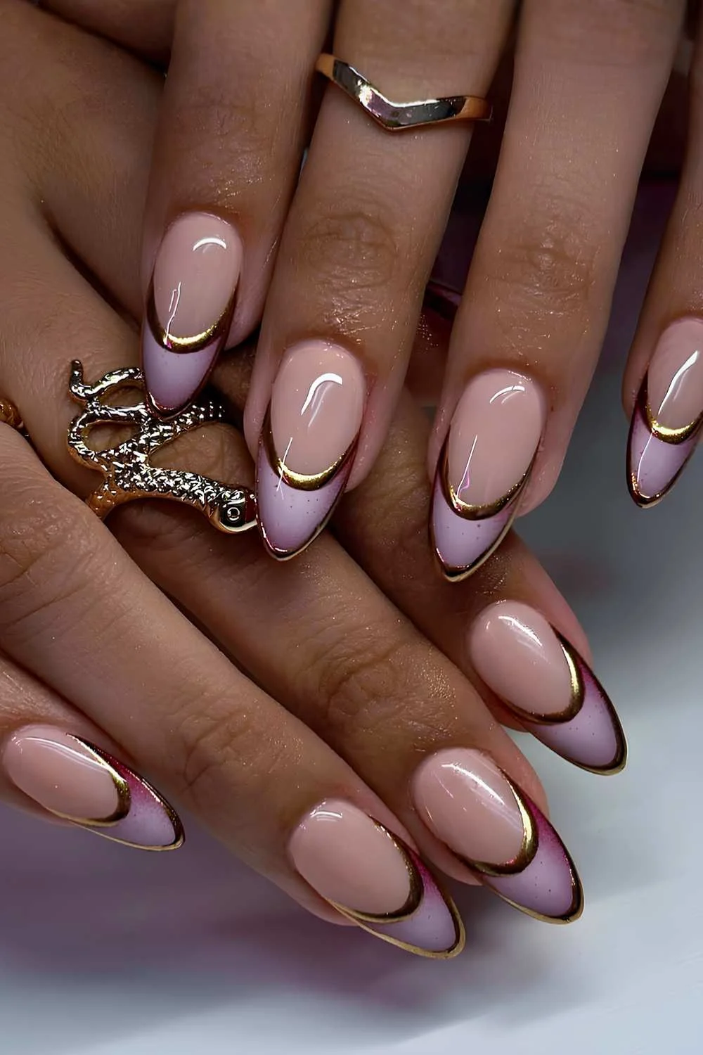 Purple French manicure with gold outlines