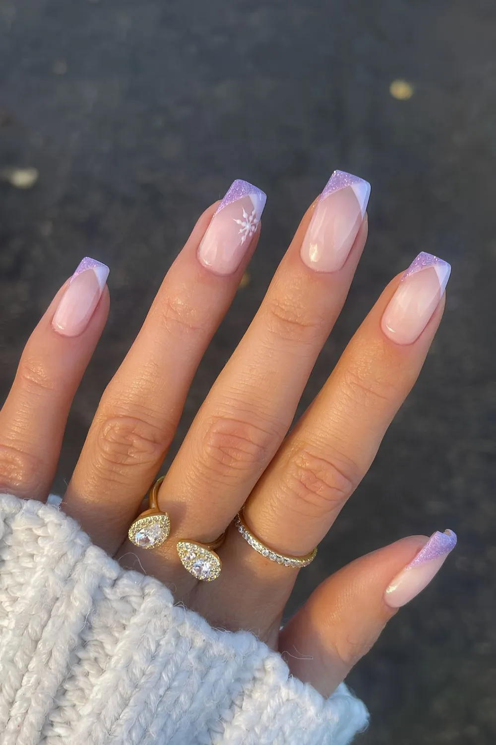 Purple and white french nails with snowflakes