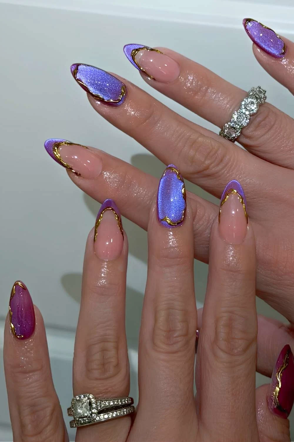 Purple cat eye mani with gold accents