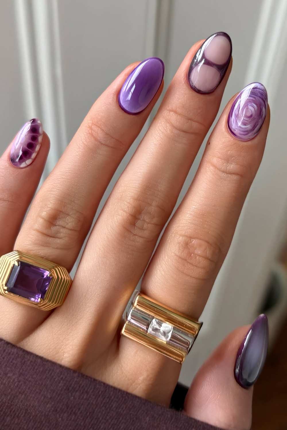 Purple mismatched nail design