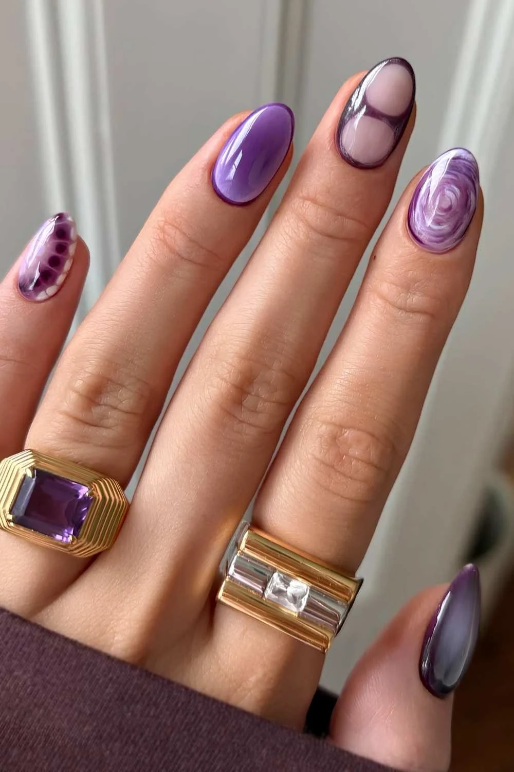 Purple mismatched nail design