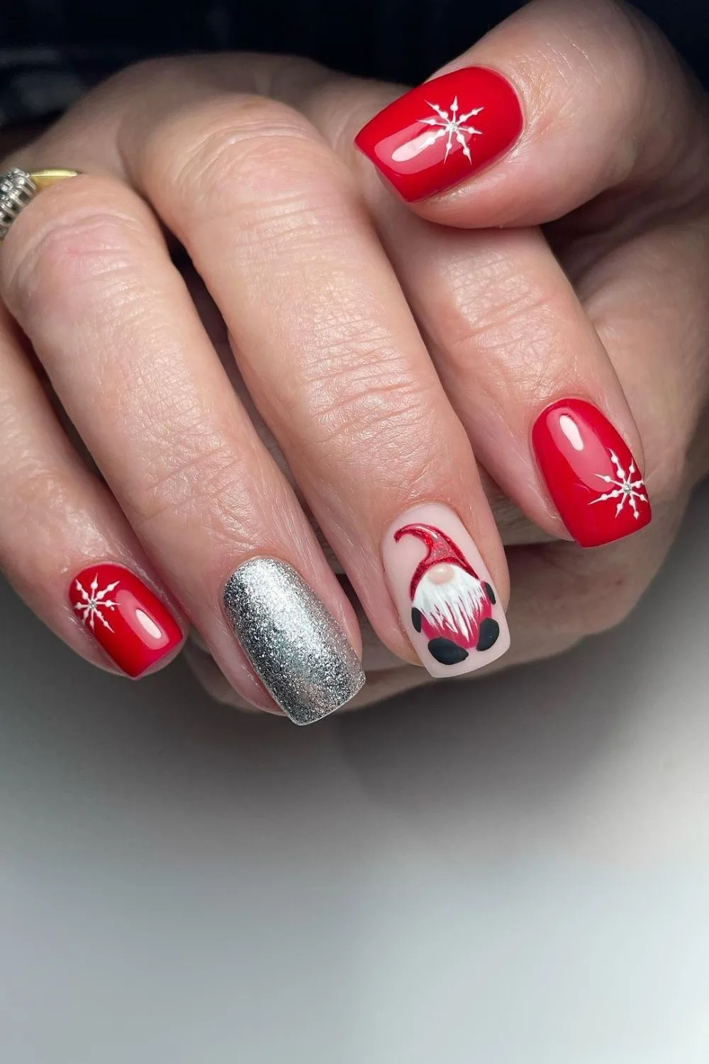 Red Christmas nails with silver and gonk accent nails