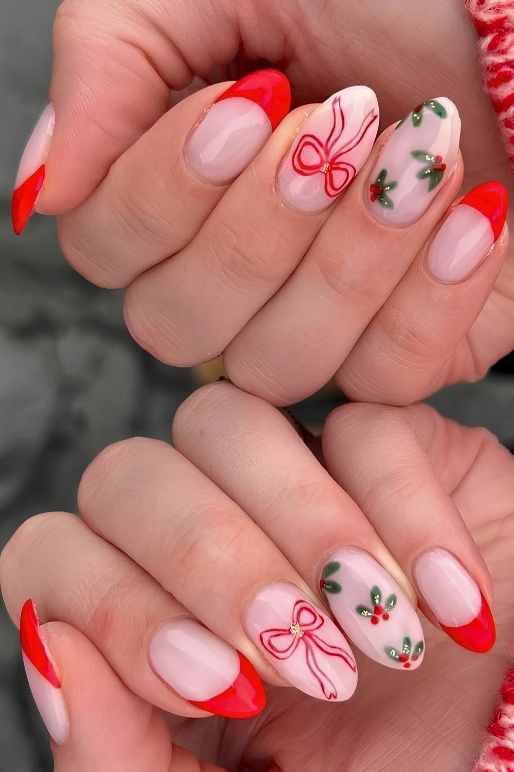 Red French nails with holly and bow art