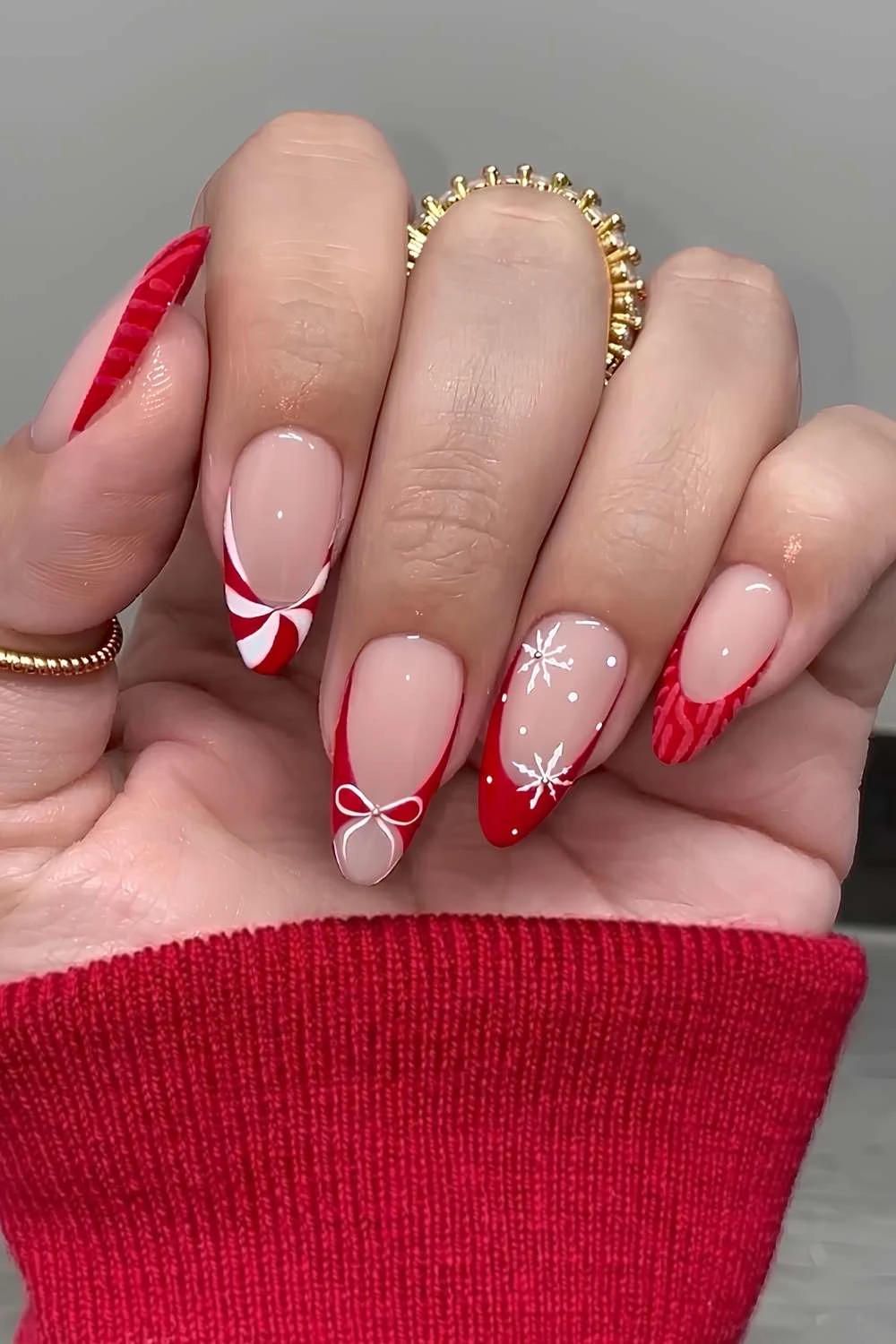 Red French tips with Christmas-inspired art