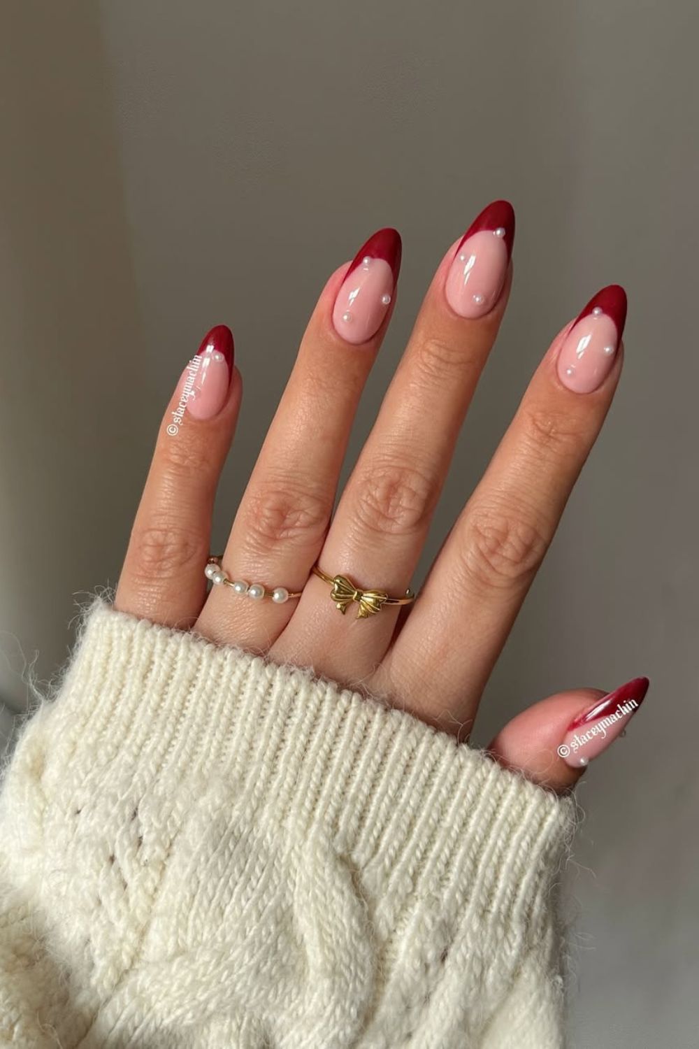 Red French tips with pearl design