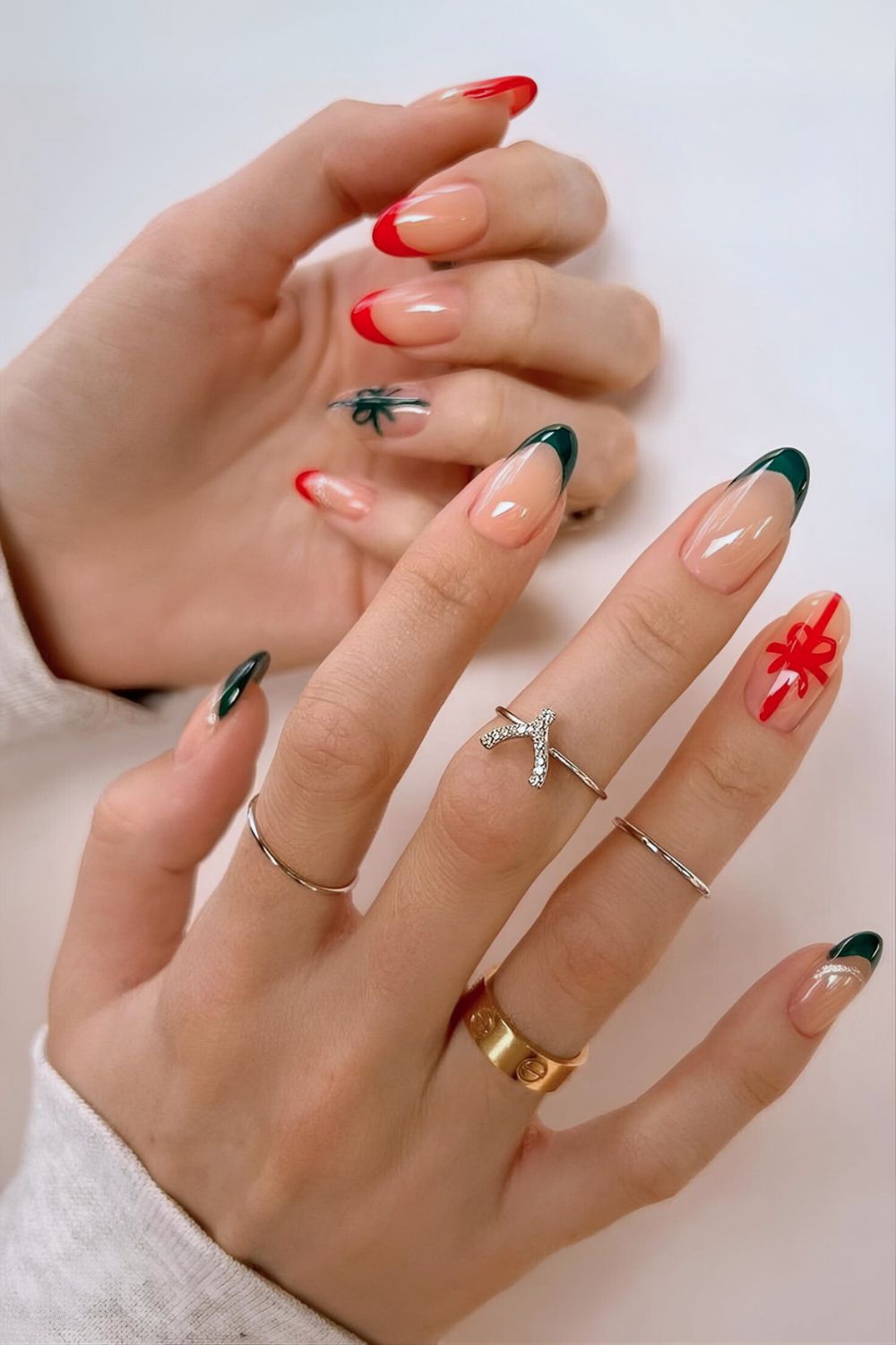 Red and green French nails with gift bow art