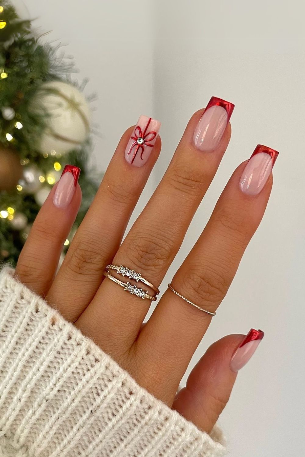 Red chrome French mani with gift bow accent