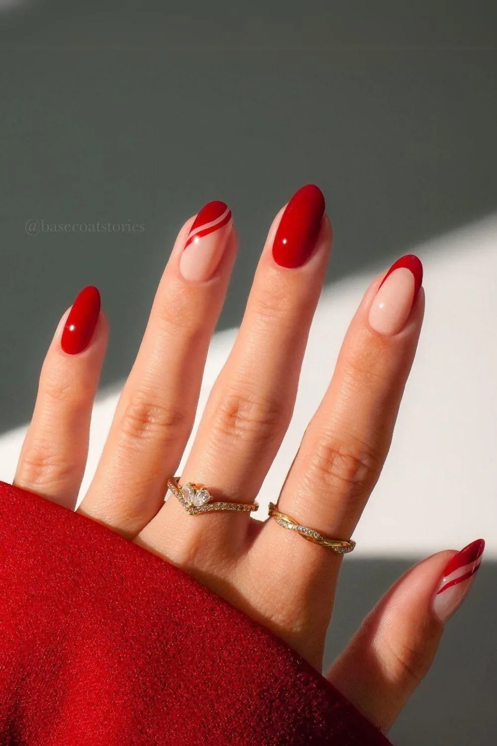 Red manicure with double side French tip accents