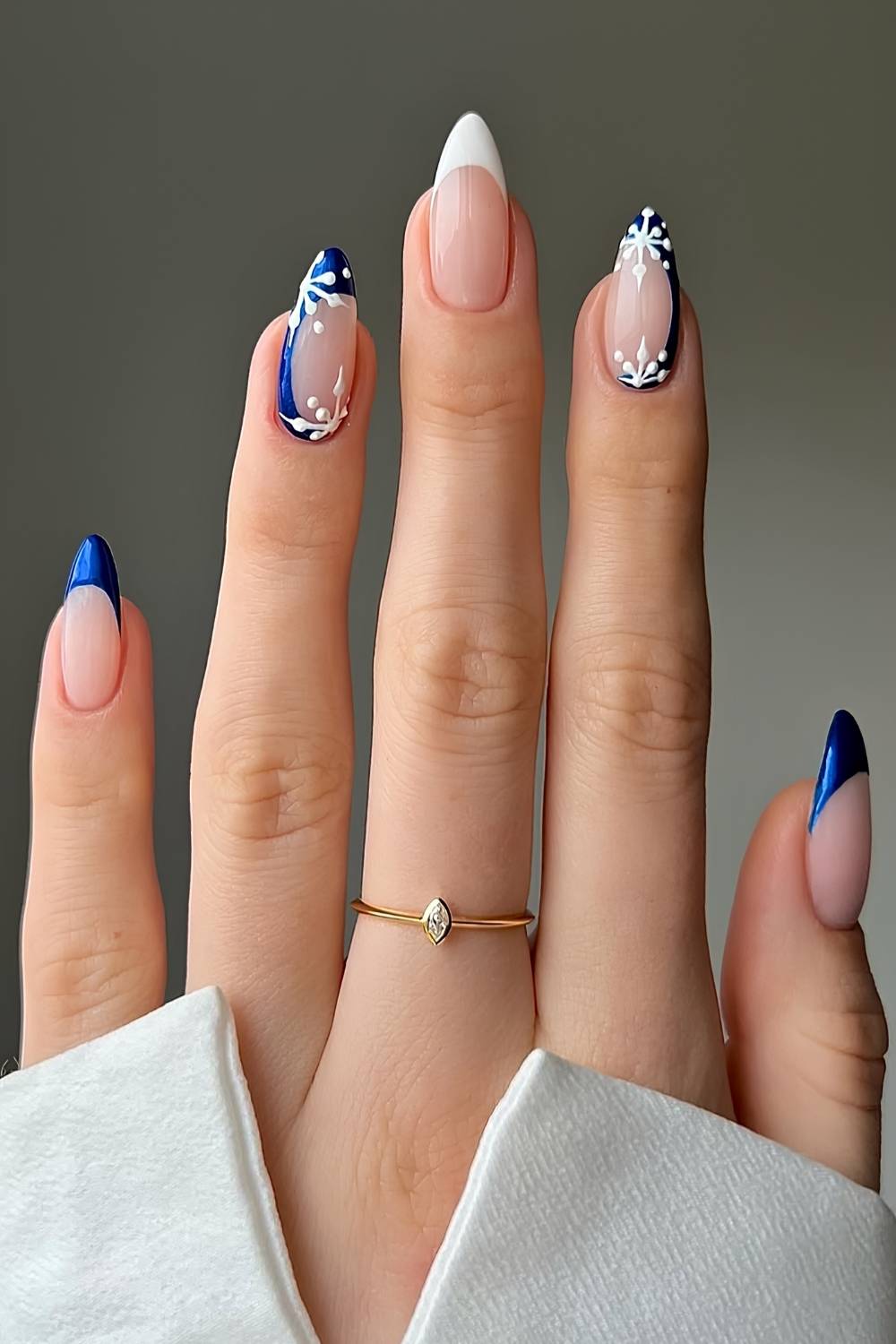Sapphire blue and white nails with snowflakes