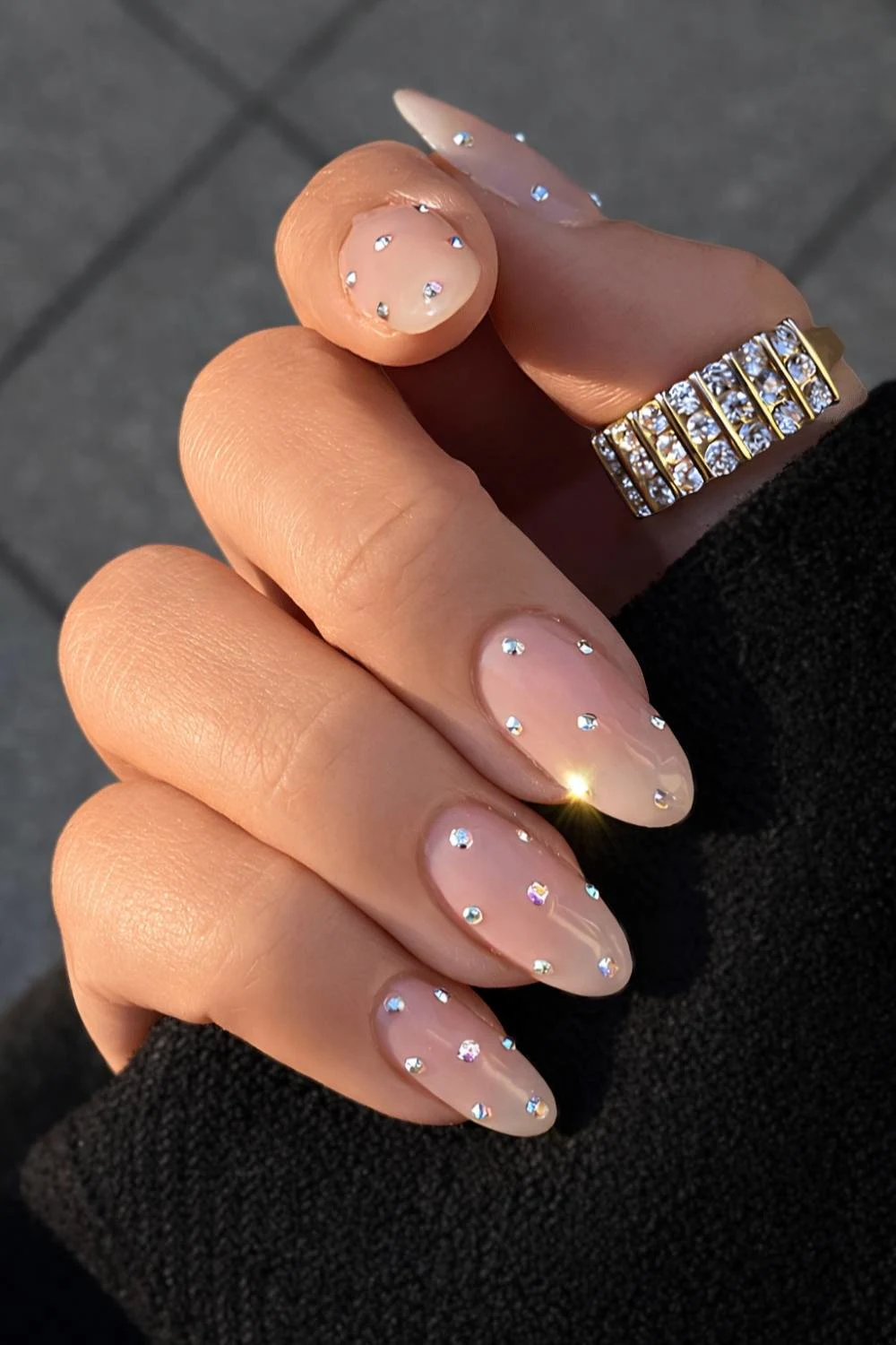 Sheer milky nails with rhinestones