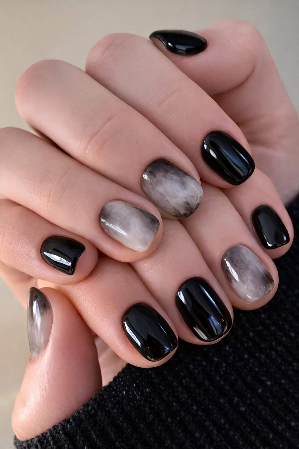Short black and white marble nails