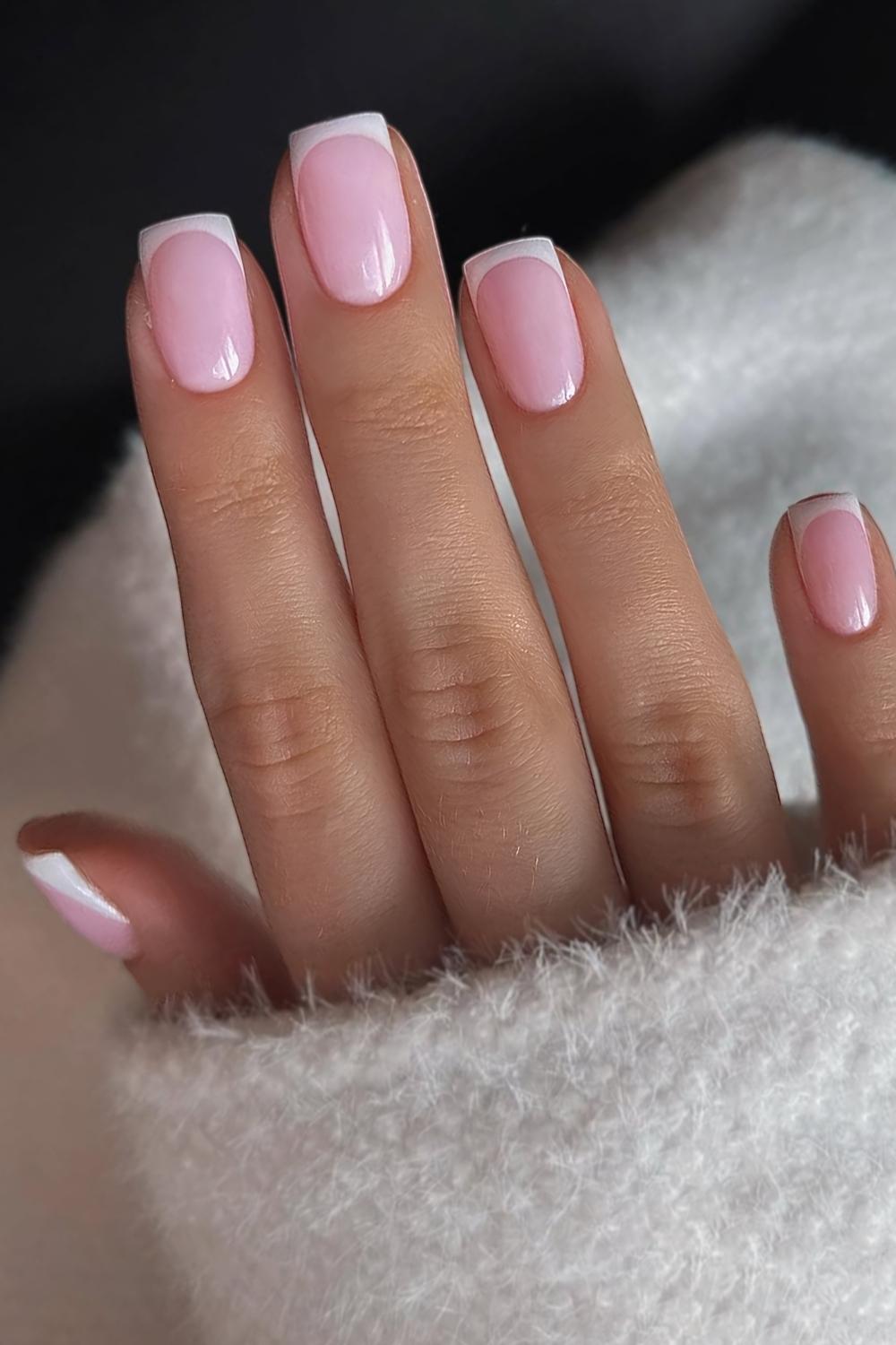Short white French mani on pink base