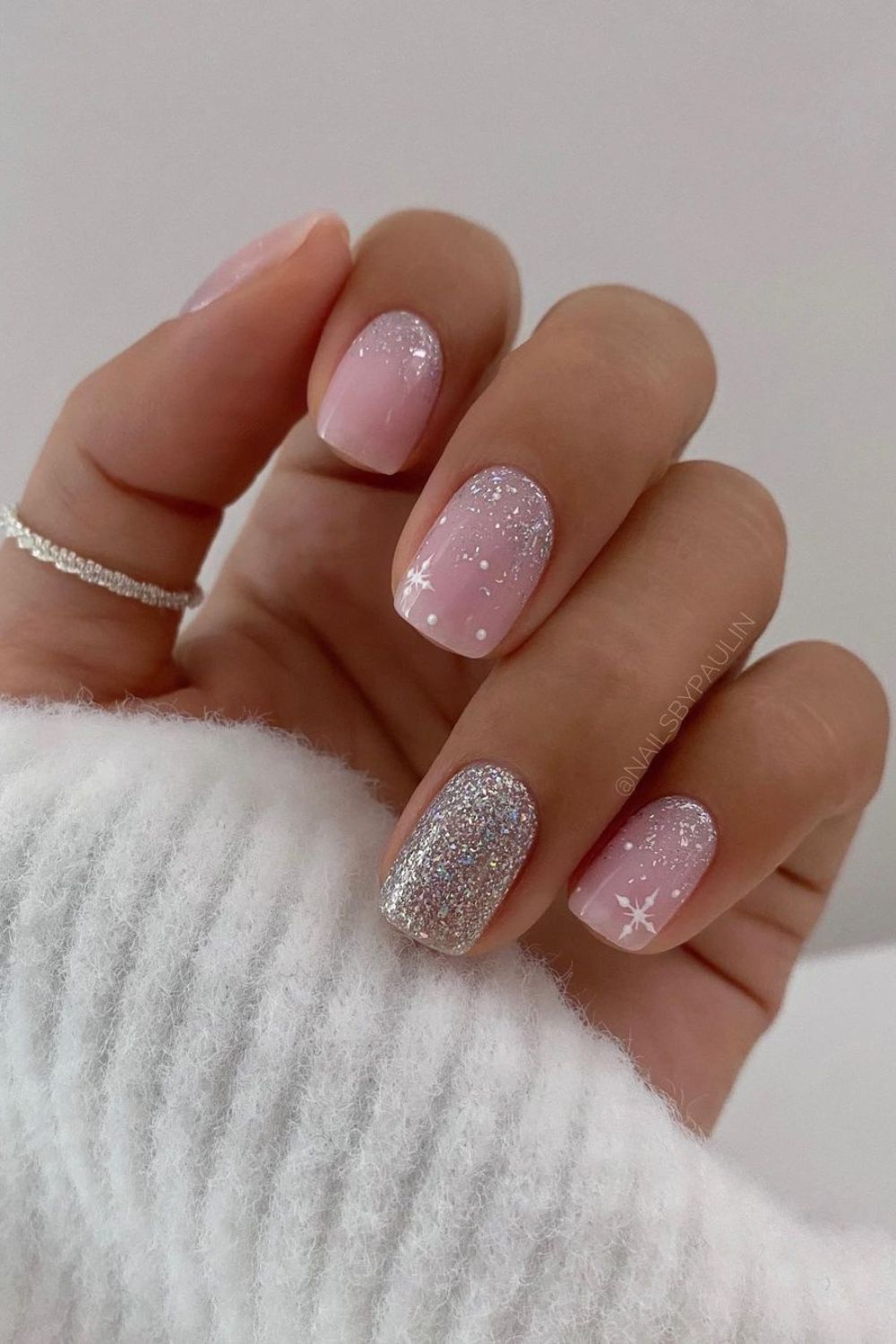 Silver and soft pink nails with snow effect