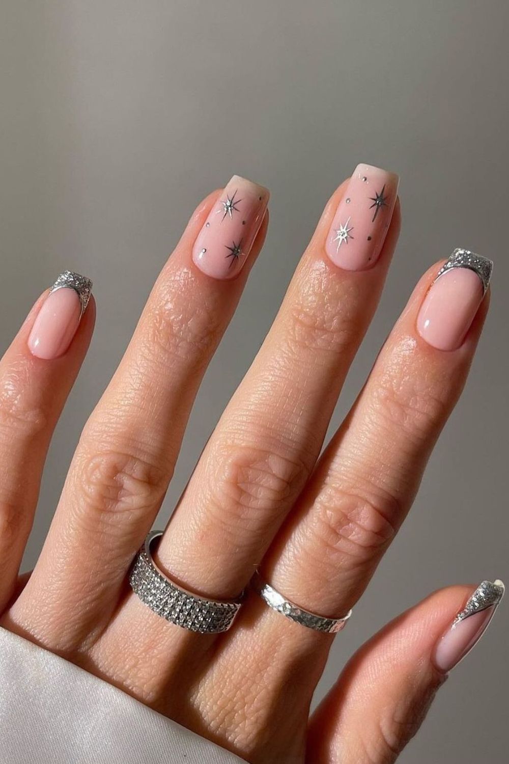 Silver celestial french tip nails