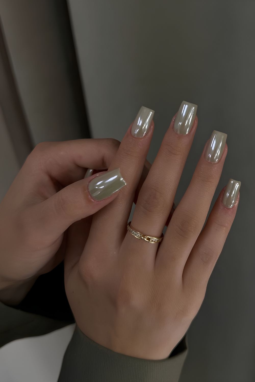 Soft green crystal chrome nails