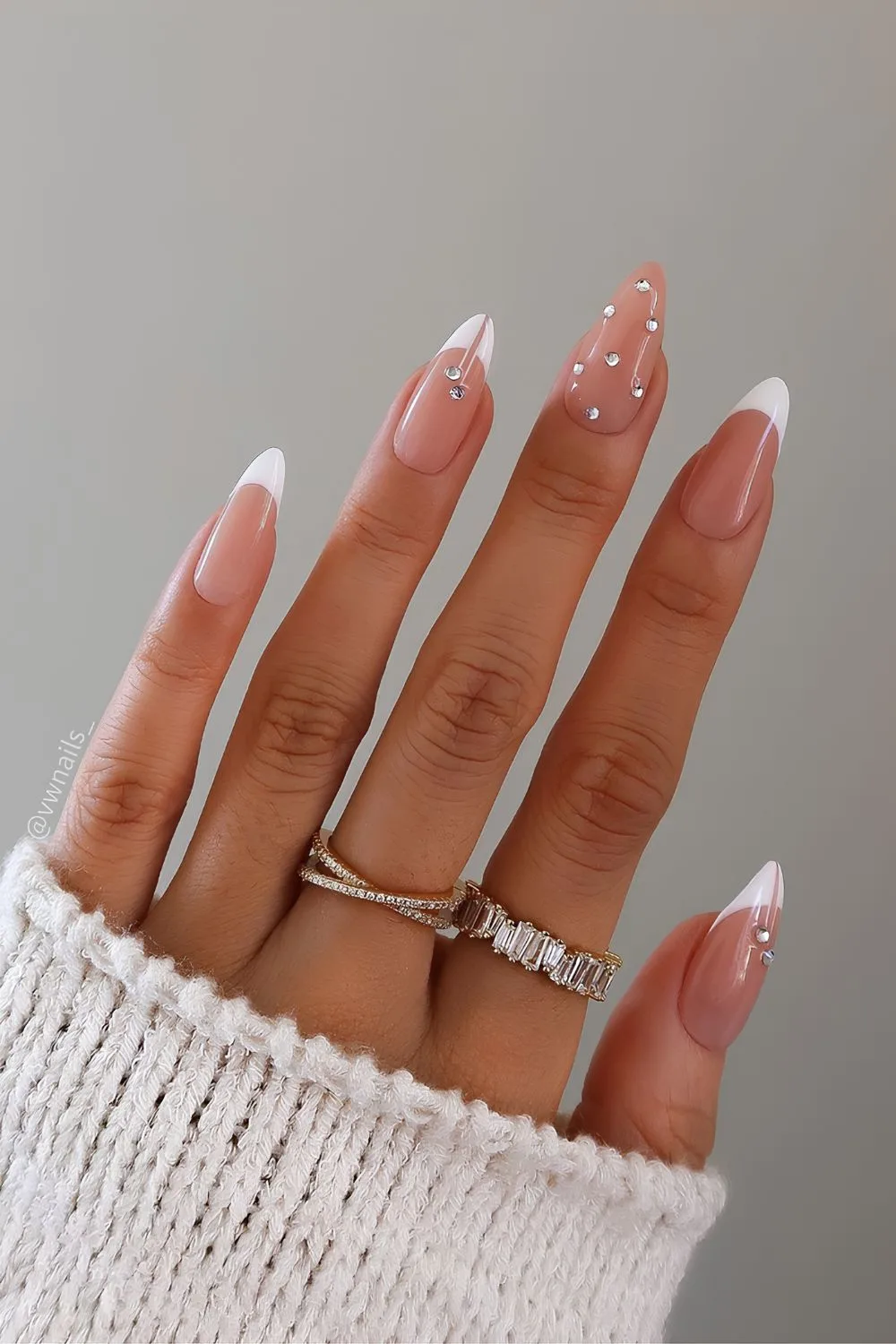 Studded white French tip mani