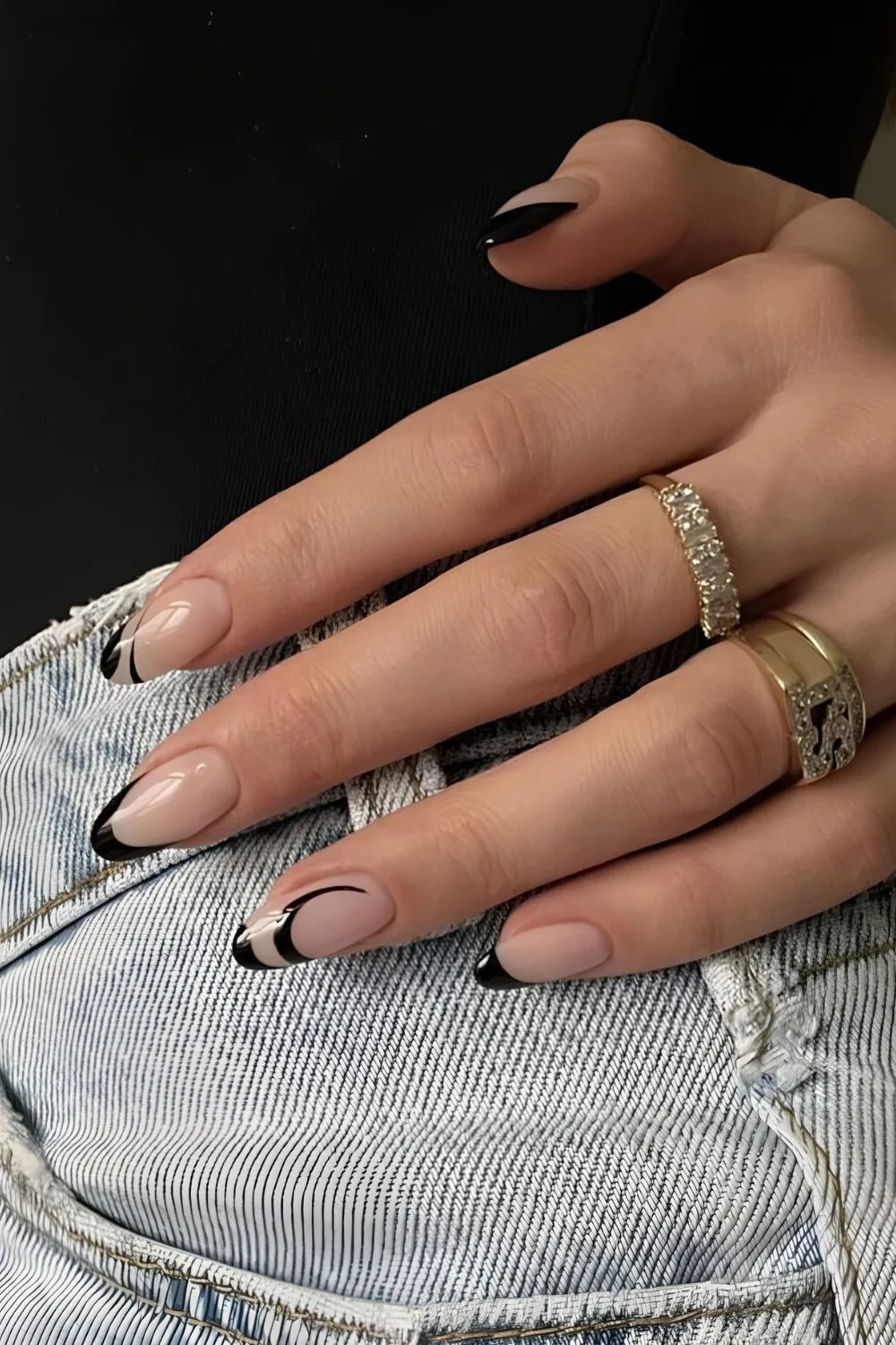 Swirly black French tip nails