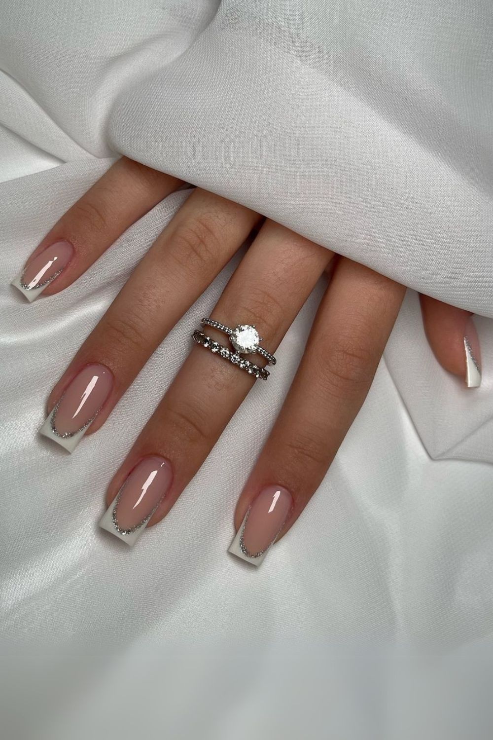 White French tips with silver glitter edge