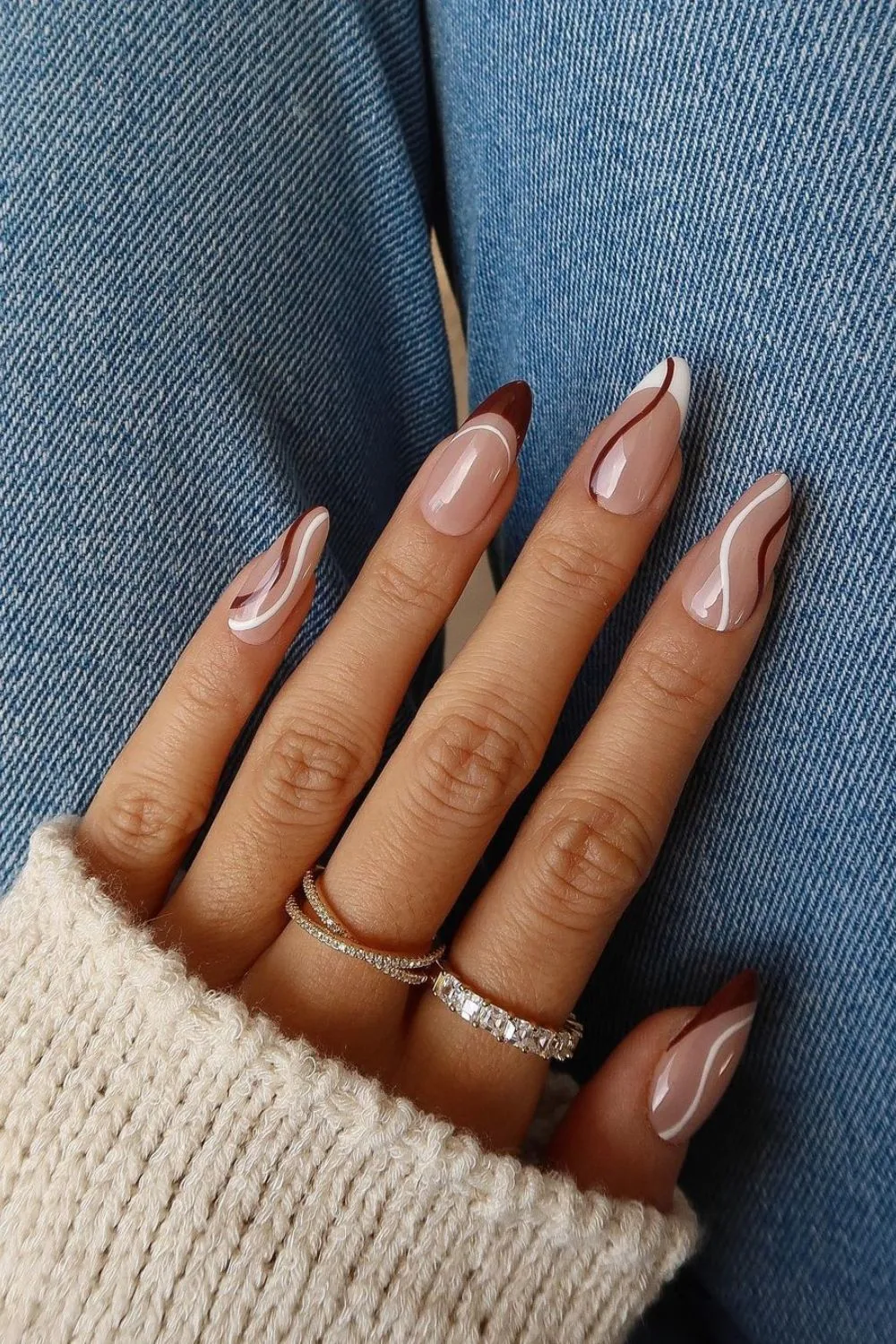 White and burgundy swirl nails