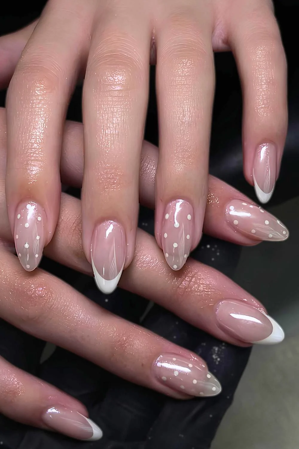 White chrome French nails with polka dots