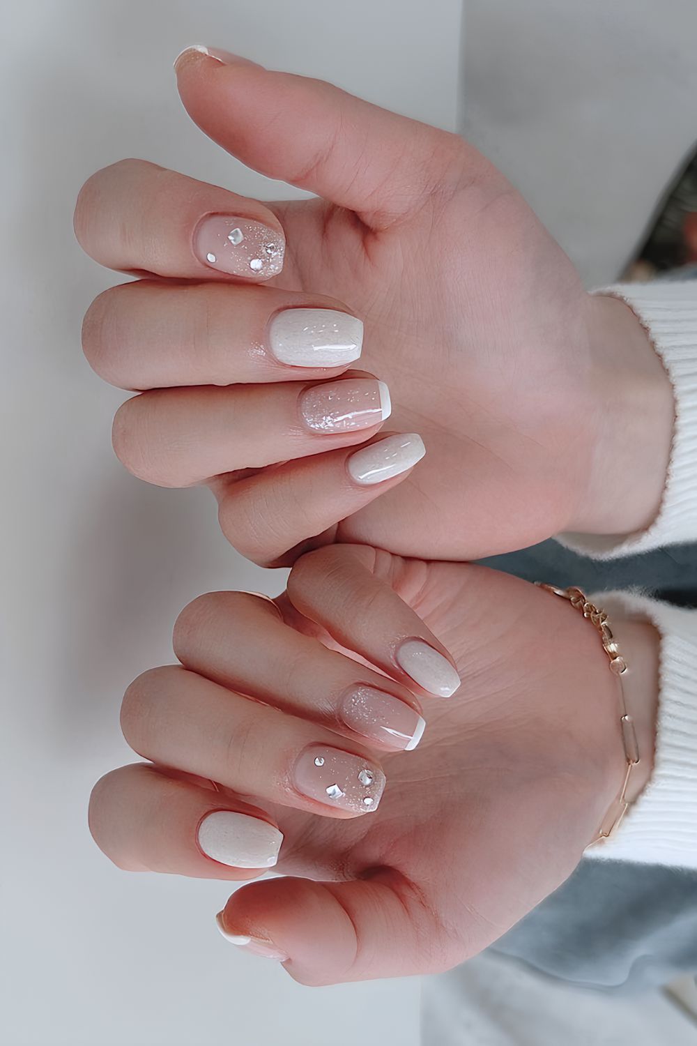 White mani with glitter and rhinestones