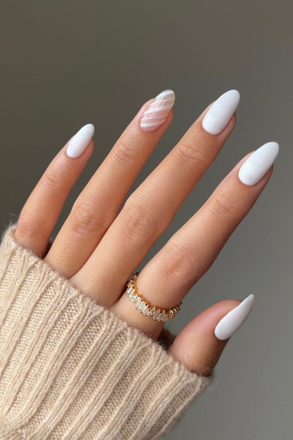 White mani with subtle candy cane stripe accent nails