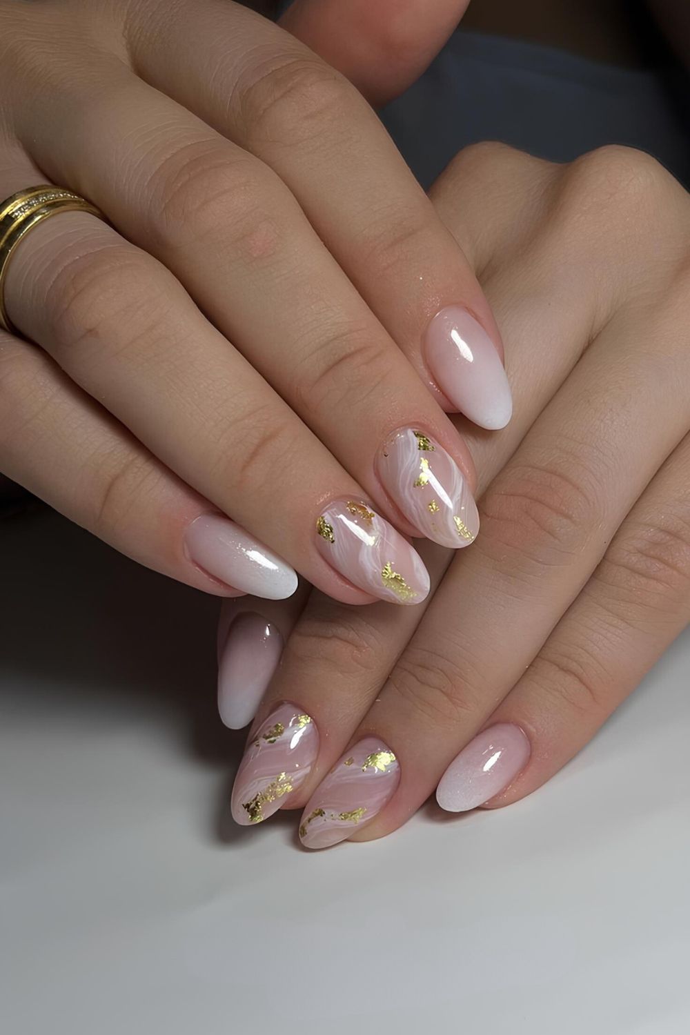 White marble-pattern nails with gold foil