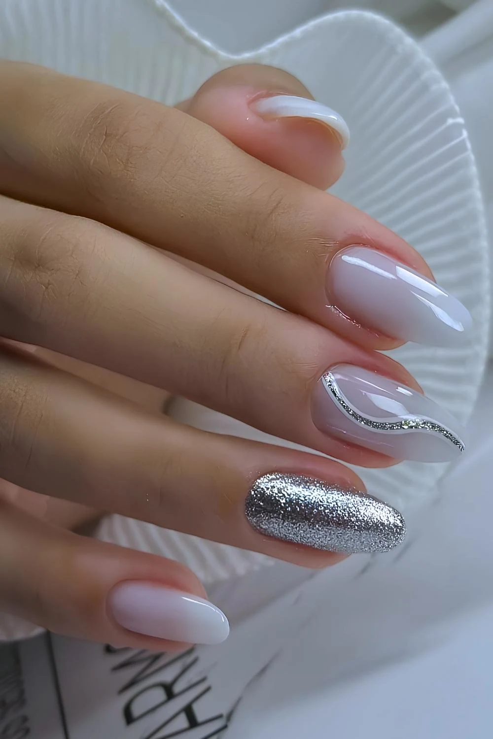 White nails with silver glitter details