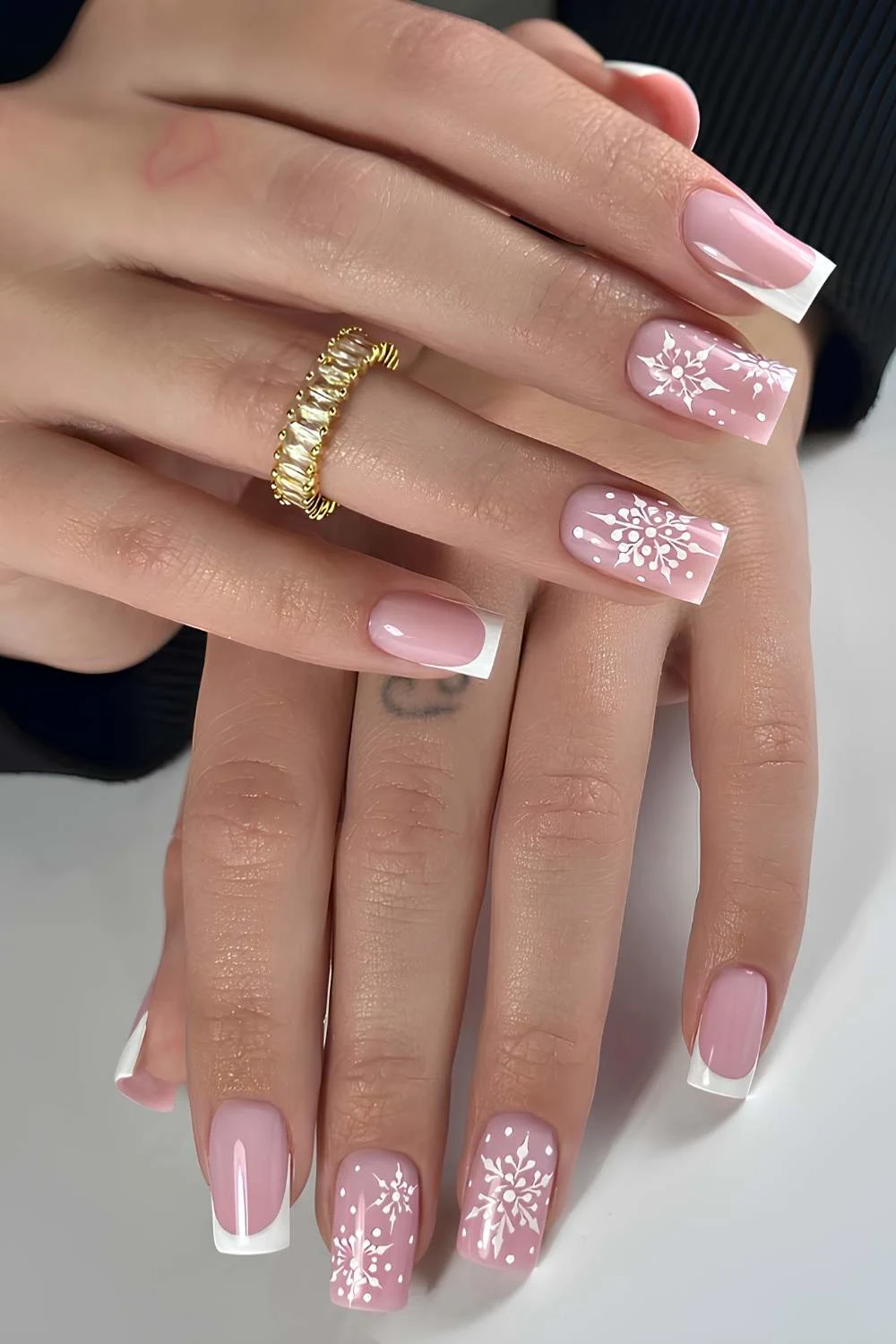 White square French nails with snowflakes