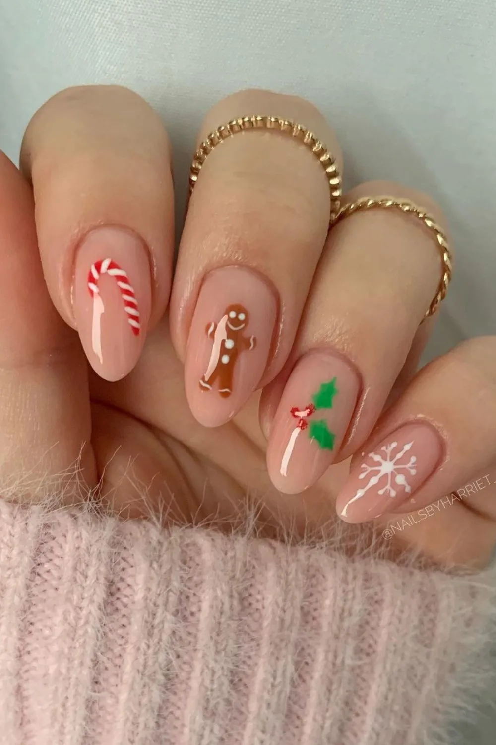 christmas nails with mistletoe, gingerbread, candy and snowflake