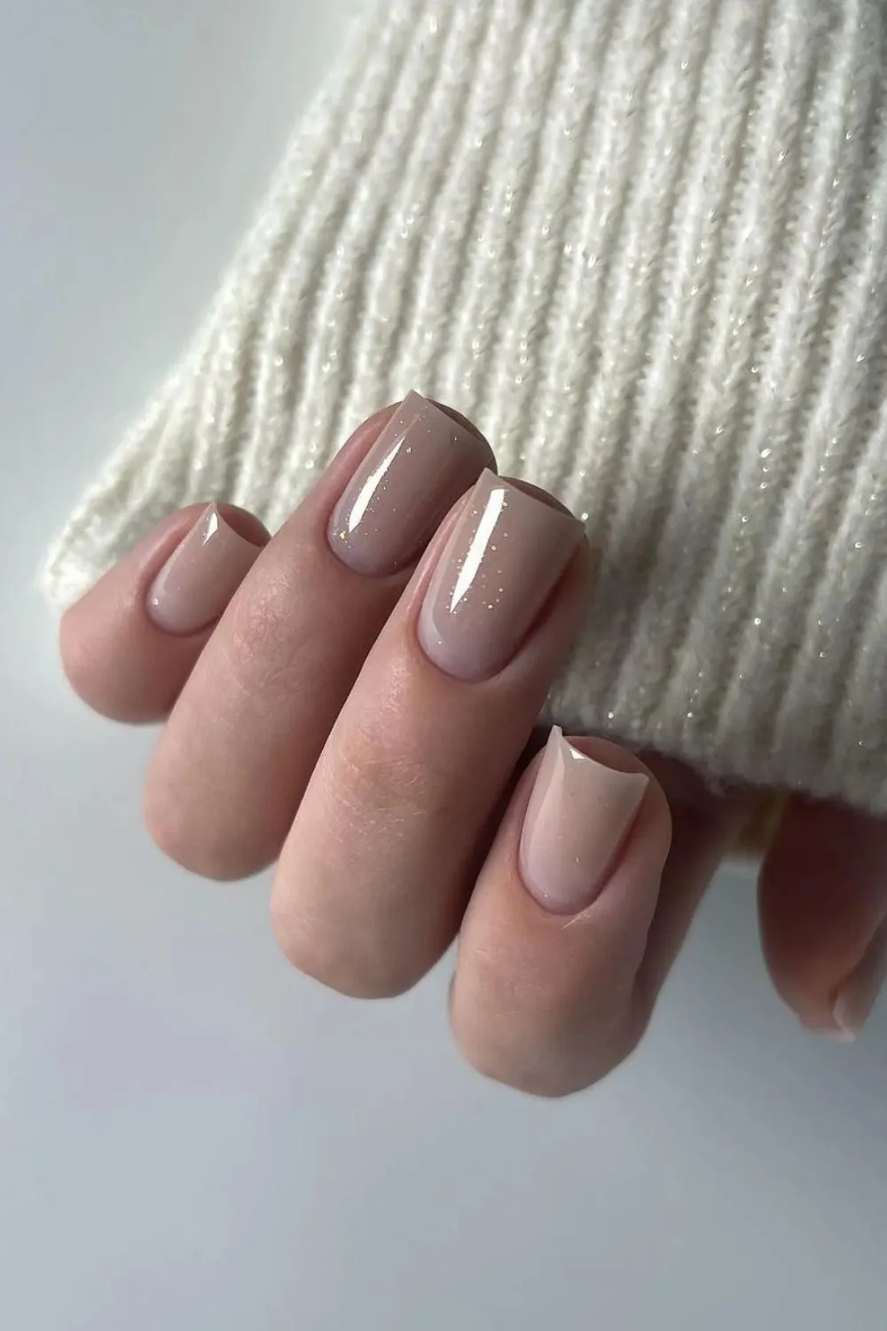 short nude nails with shimmer