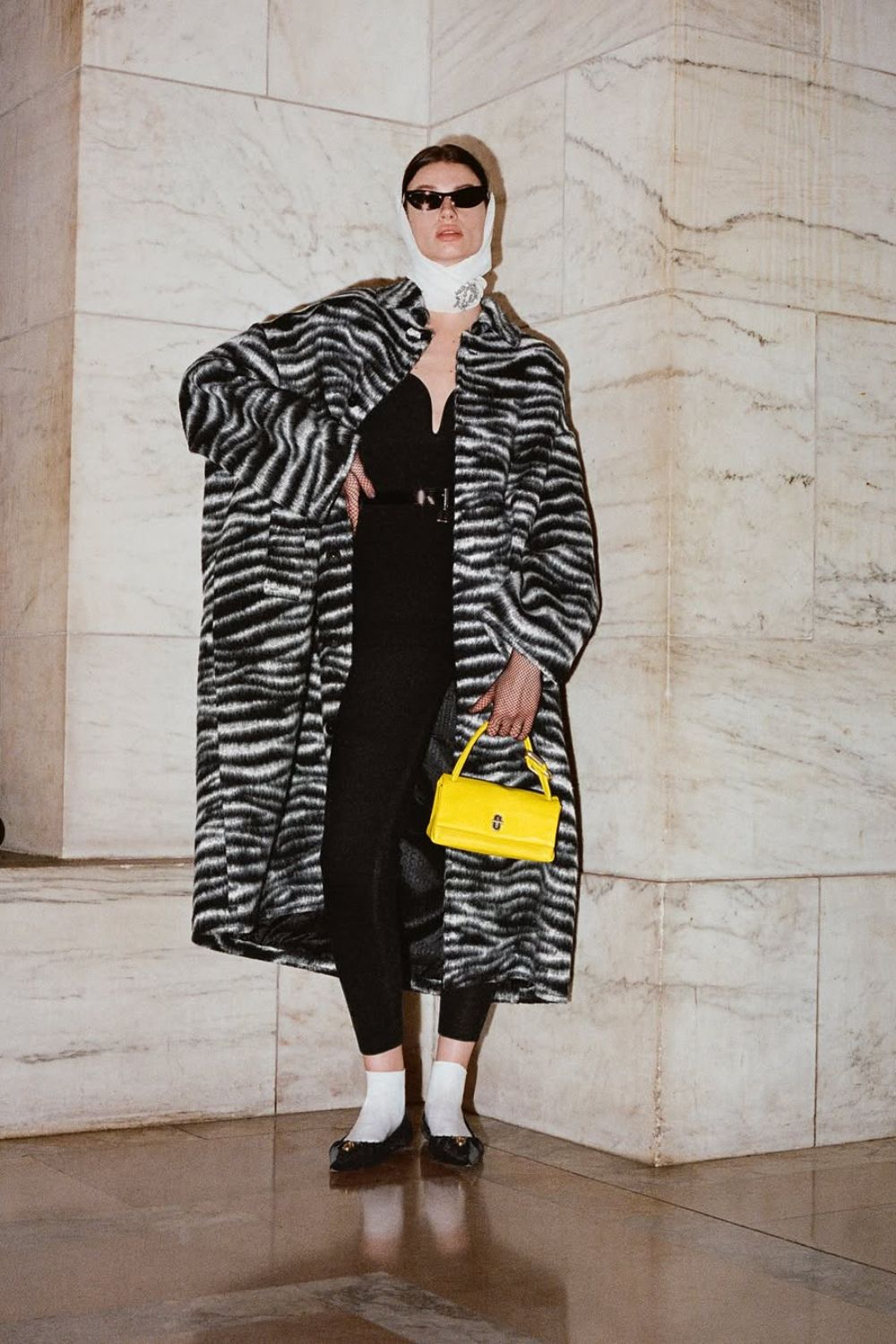 A model wearing zebra print coat