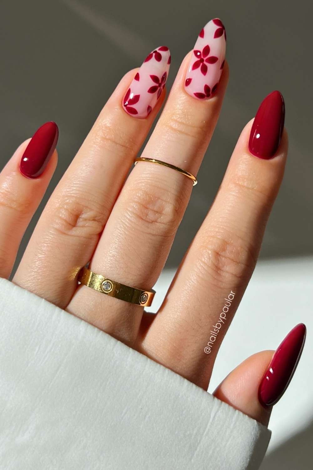 Almond cherry red floral nails