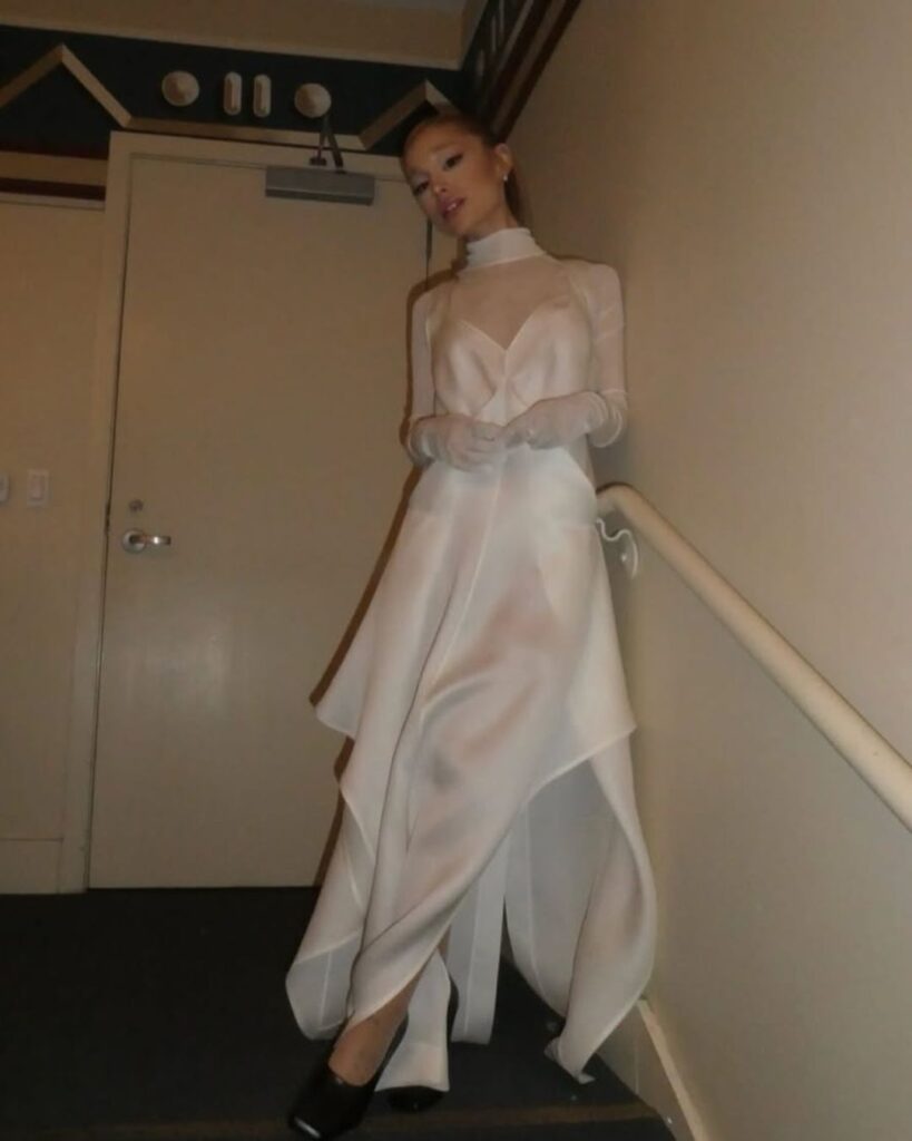 Arianaa Grande in a flowy all white gown at a private screening of Wicked