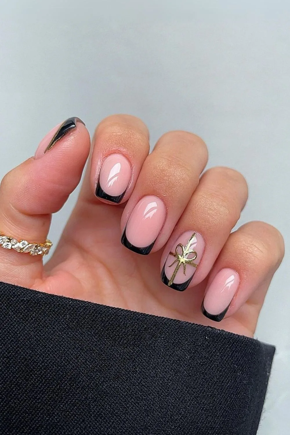 Black French nails with gift bow art