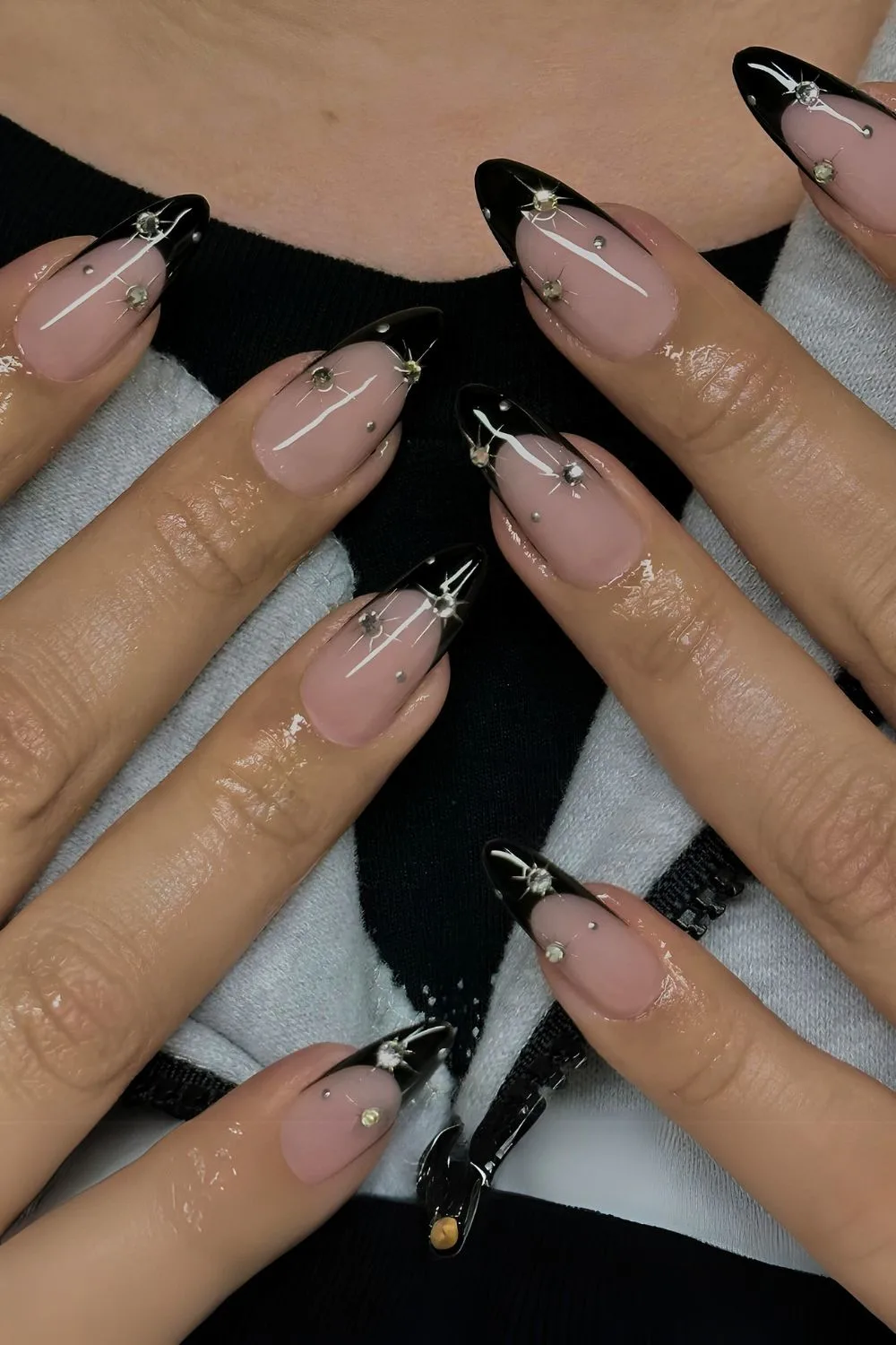 Black French nails with silver celestial accents