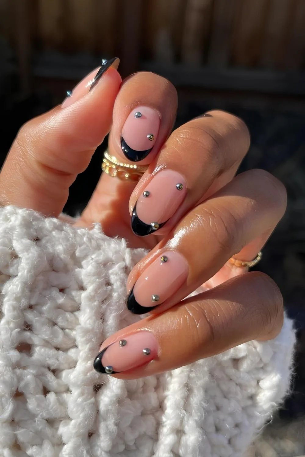 Black French nails with silver studs