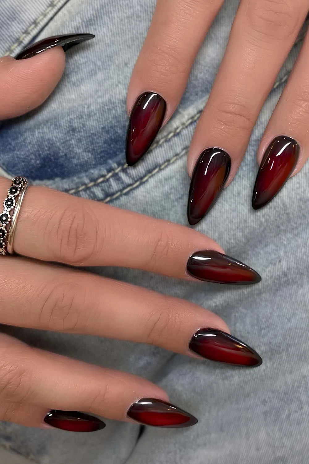 https://thepinkissue.com/wp-content/uploads/2024/12/Black-and-cherry-red-aura-manicure.jpg.webp?utm_source=chatgpt.com