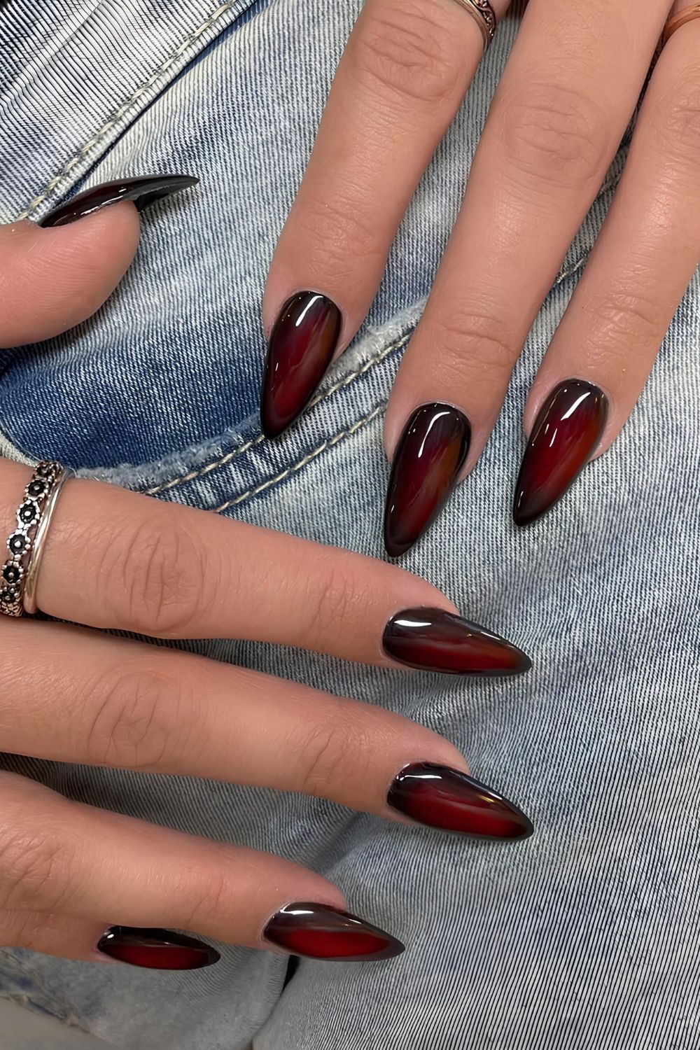 Black and cherry red aura nails